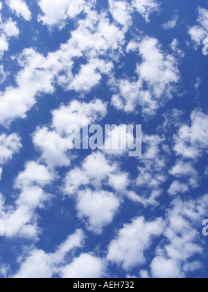 Blue color sky with white fluffy cloud background Stock Photo - Alamy