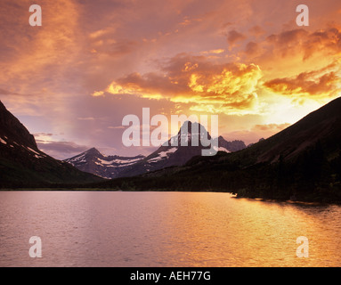 Sunset on Swiftcurrent Lake with Mount Wilbur Glacier National Park Montana Stock Photo