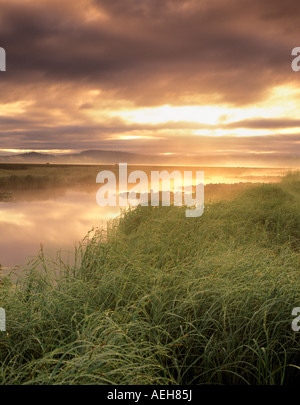 Fog and sunrise on Klamath Marsh Oregon Stock Photo