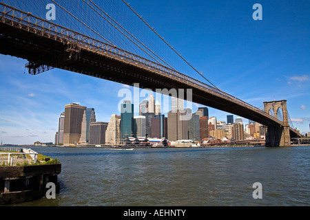 Brooklyn Bridge and Lower Manhattan skyline viewed from Empire Fulton Ferry State Park, Dumbo District, Brooklyn, New York City Stock Photo