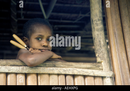 Boy in a village along Sepik River Papua New Guinea Stock Photo