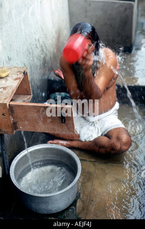 Sadhu, hinduistic holy man, morning wash, Padna, India Stock Photo