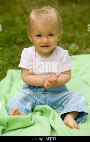 A 10 month old baby girl playing Stock Photo