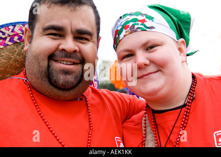 Two happy members of the parade unit from State Farm Community Volunteer team. Cinco de Mayo Fiesta. "St Paul" Minnesota USA Stock Photo