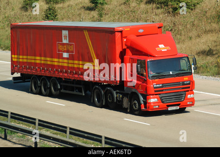 Royal Mail red DAF CF hgv lorry truck power unit & driver soft side sliding curtain articulated trailer raised axle to save tyre wear M25 UK motorway Stock Photo