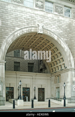 Archway entrance to Thames House & MI5 the governments domestic intelligence agency headquarters HQ centre Grade II listed Building London England UK Stock Photo