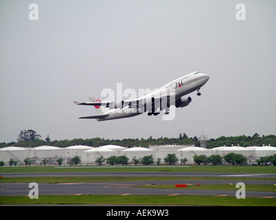 JAL 747 400 departing Norita  Airport Tokyo Japan.Taking off Stock Photo