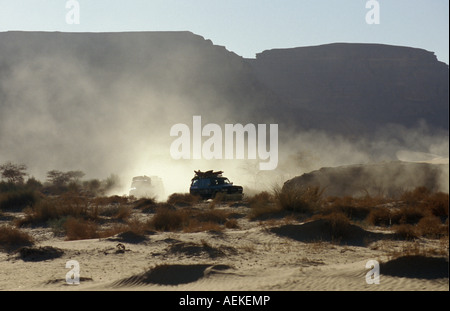Libya Ghat Akakus Vehicles in Sahara Desert Stock Photo