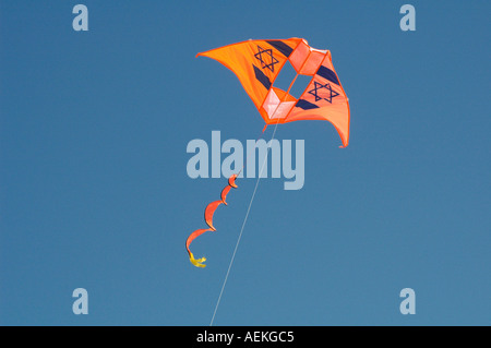 Kite with Star of David Jewish symbol flying in the sky Stock Photo