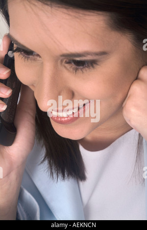 Young Pakistani girl talking on cell phone Stock Photo