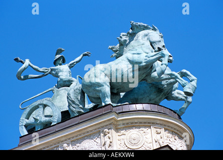 Statue on top of colonnade, part of Millennium Monument, Heroes’ Square, Budapest, Hungary Stock Photo