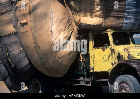 Severely overloaded lorry on the roadside near Bikaner in the Thar Desert.   No MOT necessary. Stock Photo