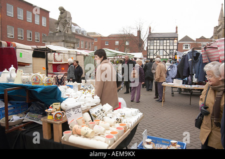 Shoppers walk around Lichfield town centre. Stock Photo