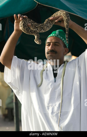 Snake Charmer in Marrakech's Jemaa el Fna Square Stock Photo