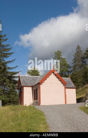 Traditional scottish timber clad building, croft or cottage,  with larch lap boarding, Braemar, Cairngorms National Park Scotland,  UK Stock Photo