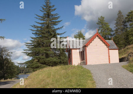 Traditional scottish timber clad building, croft or cottage,  with larch lap boarding, Braemar, Cairngorms National Park Scotland,  UK Stock Photo