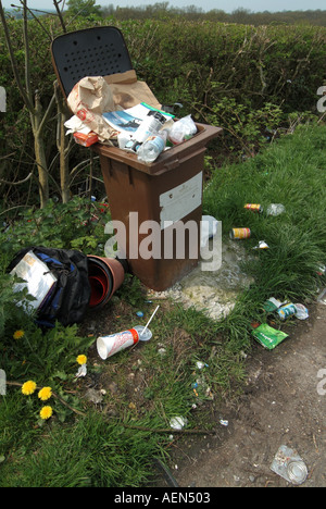 Near Newbury roadside lay by rubbish bin overfilled and used as a general dumping area Stock Photo
