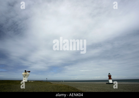 Point of Ayre foghorn and small lighthouse with emphasis on big blue sky with whispy white clouds Isle of Man IOM Stock Photo