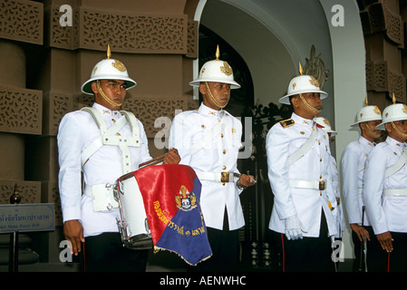 Soldiers in a military band standing to attention, Grand Palace, Bangkok, Thailand Stock Photo