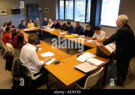 Mixed ethnic group young foreign students studying in Law lecture seminar Aberystwyth University  wales UK Stock Photo