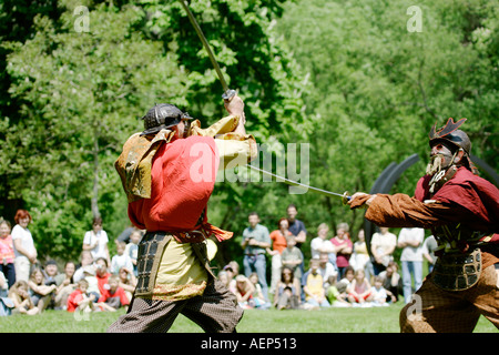 a demonstration of old fight techniques in the costumes of Samurai at ...