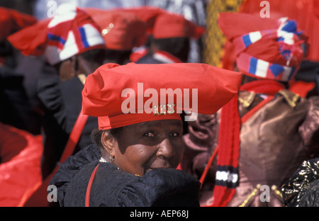 Namibia Okahandja Red Flag Herero women gathered in traditional wear at ceremonial occasion Stock Photo