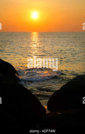 Sunset over the Andman Sea from Kata Beach, Phuket Thailand Stock Photo