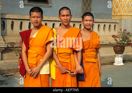 Three novice Buddhist monks, Wat Phra That Haripunchai Temple, Lamphun, Near Chiang Mai, Thailand Stock Photo