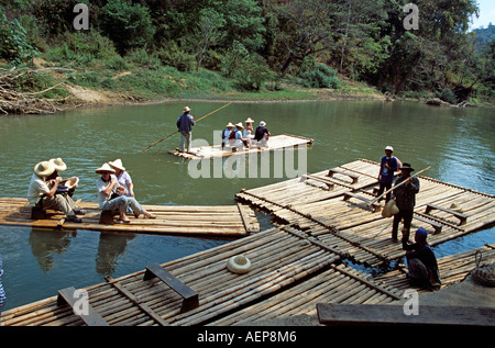 Tourists on bamboo rafts, Mae Ping River, Mae Ping, near Chiang Mai, Thailand Stock Photo