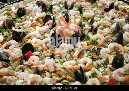 Pan with fresh cooked spanish Seafood Paella,Pfanne mit spanischer Reis Speise Paella mit Meeresfruechten Stock Photo
