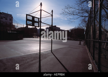 Basket Ball Court in Urban Setting Late Afternoon Stock Photo