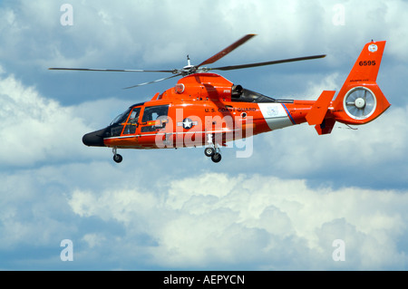 A US Coast Guard HH 65B SAR Helicopter demonstrates a search and rescue mission at Binghamton Airshow New York Stock Photo