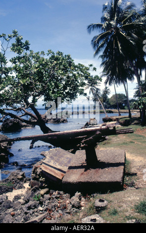 Old World War 2 gun on the banks of Madang Harbour in Papua New Guinea Stock Photo