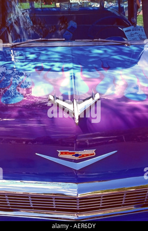 An head on shot of a purple and blue Chevy roadster, complete with a flaming paint job, at a classic car show in Utah, USA Stock Photo