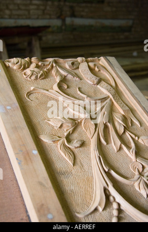 Hand carved decorative piece across bow of new gondola at the gondola maker boatyard of D Tramontin Figli Venice Italy Stock Photo