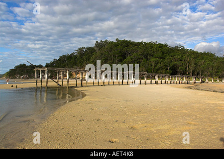 The remains of the derelict McKenzies Jetty at Kingfisher Bay Fraser Island Queensland Australia Stock Photo