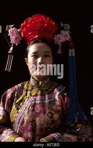 China Chinese Asian Orient,communism,communist,Beijing,Peking,Yiheyuan Summer Palace,guide,traditional costume,China007 Stock Photo