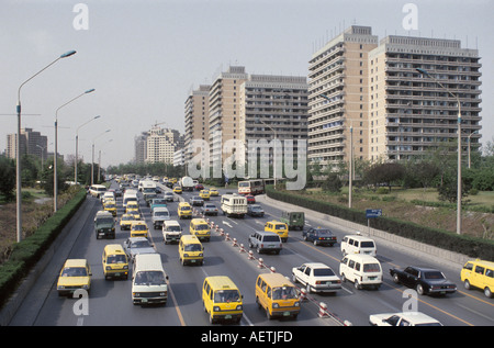 China,Chinese,Asia,Asian Asians,Far East,Eastern,Orient,communism,communist,Beijing,Peking,South Chao Yang Men Street,traffic,transportation,condomini Stock Photo