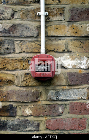 Fire alarm and brick wall Stock Photo