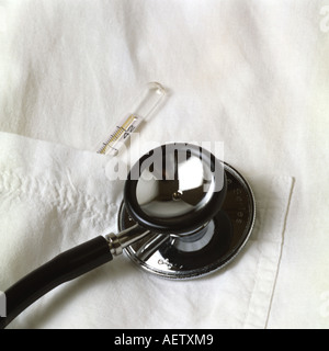 Stethoscope and thermometer in a pocket Stock Photo
