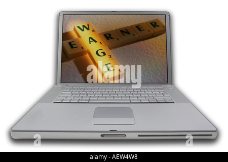 LAP TOP COMPUTER WITH SCRABBLE LETTERS ON SCREEN SPELLING WORDS WAGE EARNER Stock Photo