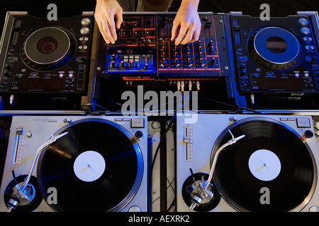 Person mixing music in a nightclub Stock Photo