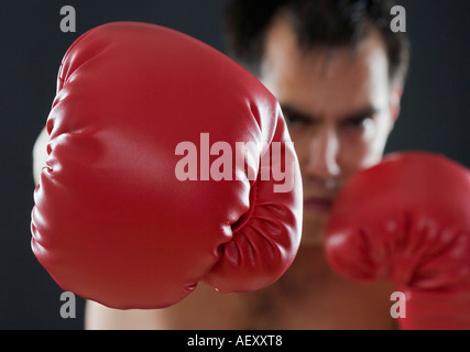 A boxer throwing punches Stock Photo