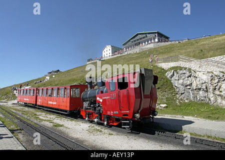 Steam engine Z 13 with red coaches waiting to take passengers from Schafberg to St. Wolfgang on a sunny summer day Stock Photo