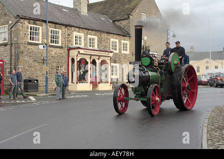 Traction engine leaving Masham Market Square North Yorkshire during the annual steam rally Stock Photo