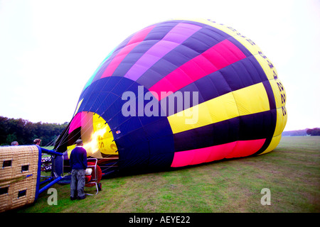 Hot air balloon being inflated Stock Photo - Alamy