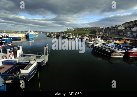 seahouses village harbour North Northumberland coast and designated an Area Of Natural Beauty Stock Photo