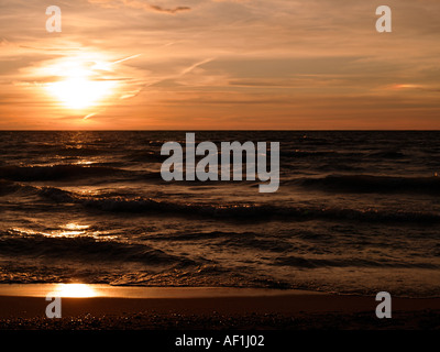 Sun sets over Lake Huron as seen from Grand Bend ON Canada Stock Photo