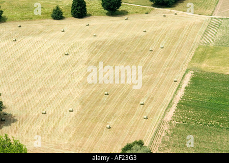 round hay bales seen from the hilltop village of Domme Dordogne France Europe Stock Photo