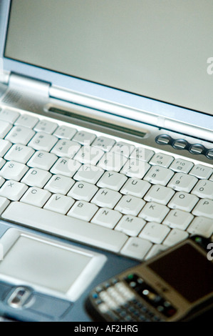 Laptop and PDA - Vertical - Close-up Stock Photo - Alamy